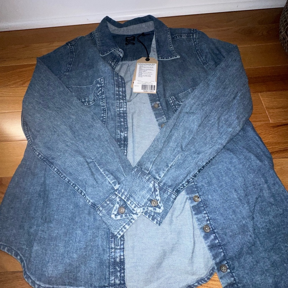 Denim button down women’s shirt.